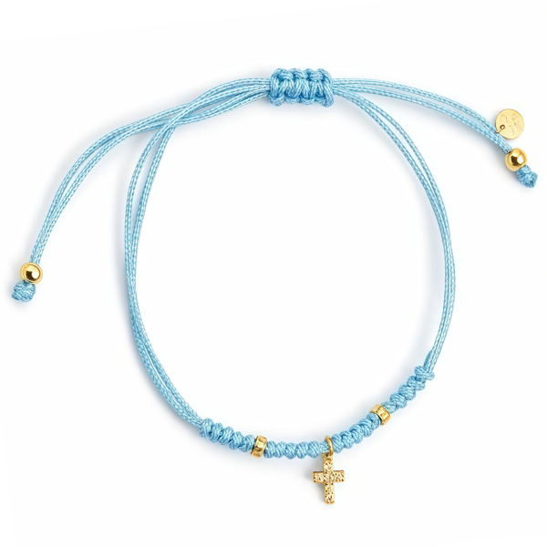 Pulsera hilo con colgante cruz en plata dorada primera ley
